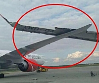 飞北京空客与波音客机莫斯科机场剐蹭！机翼破损零件散落乘客换机