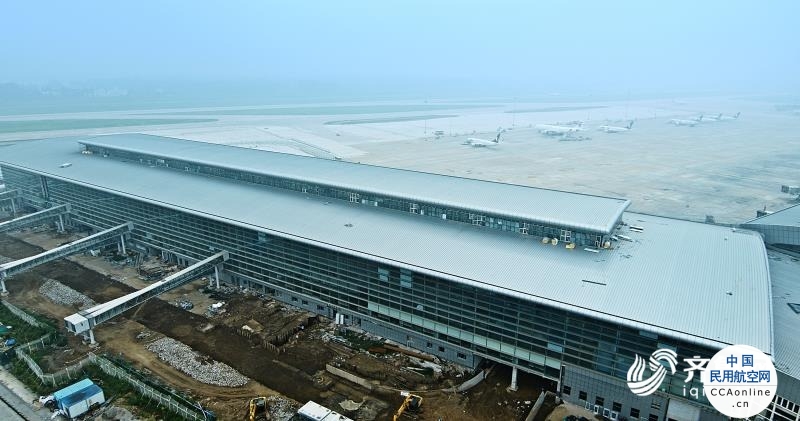 济南机场北指廊工程主体结构施工完成，计划今年底投入使用
