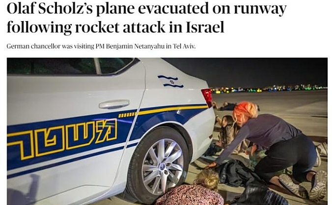 德总理离开以色列时遇火箭弹袭击机场 随行人员趴跑道躲避