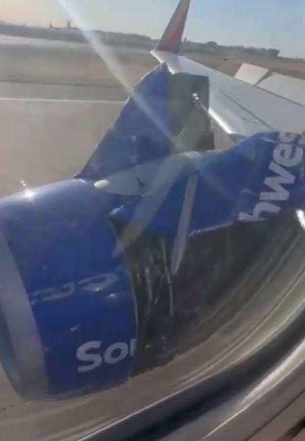紧急返航！西南航空一客机起飞时引擎罩脱落